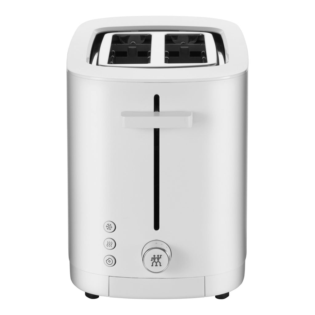 White toaster with black accents on a white background