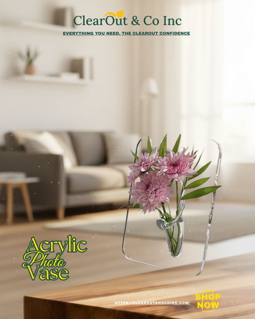 Acrylic photo vase with flowers on a table in a living room setting, featuring ClearOut & Co Inc branding.