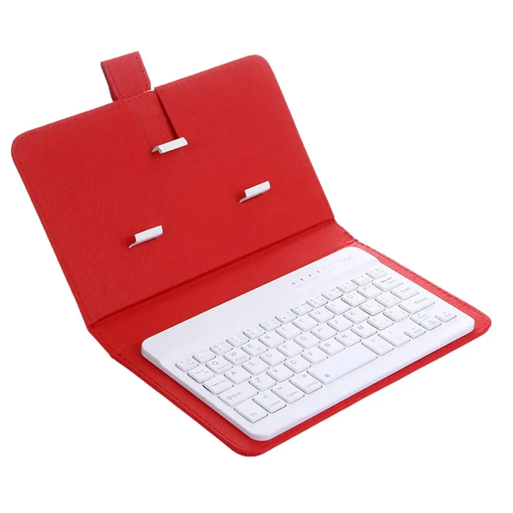 Red carrying case with a white keyboard inside on a white background