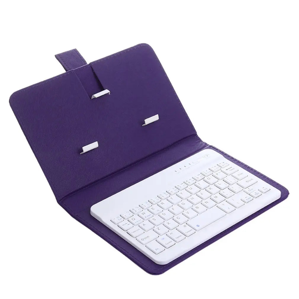 Purple keyboard cover with a white keyboard inside on a white background