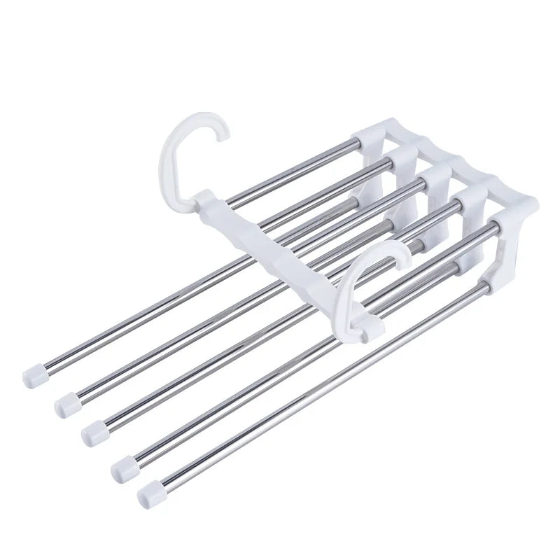 White metal towel rack with multiple bars on a white background