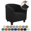Black armchair with a close-up of the fabric texture and color swatches below.
