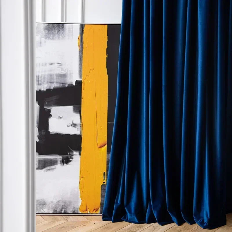 Blue curtain with abstract art in the background
