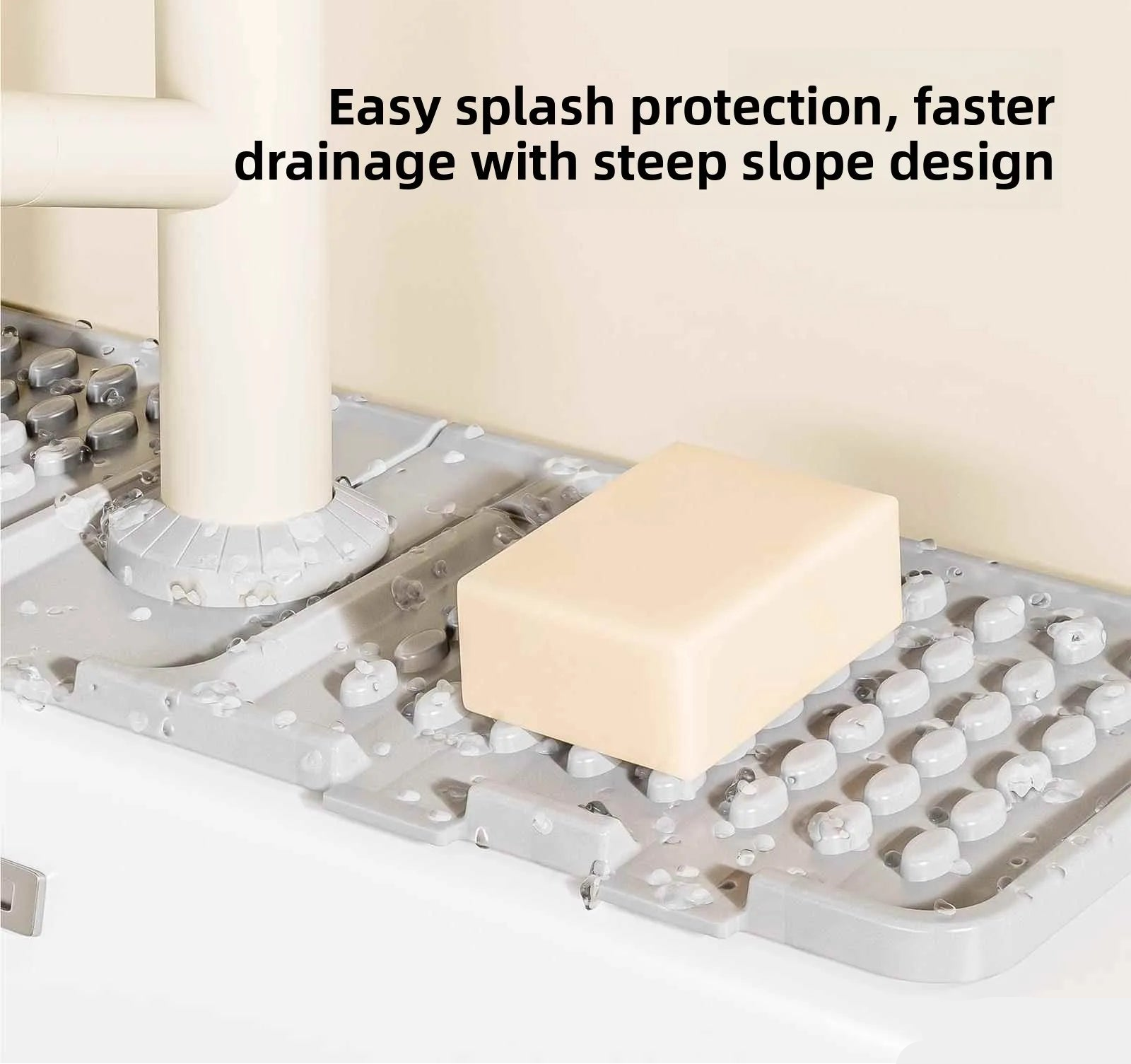 Soap on a metal soap dish with text about easy splash protection and faster drainage.