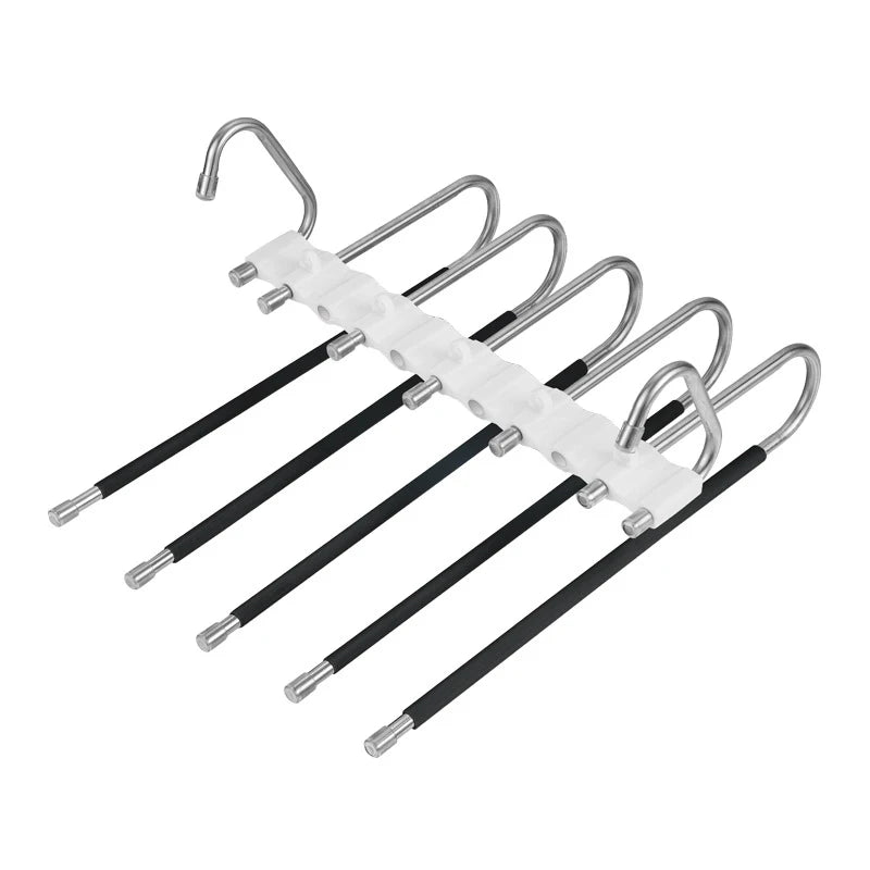 Set of metal hangers with black rods on a white background