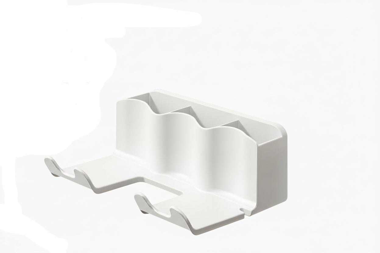 Wall-mounted hair dryer holder with a hair dryer, brush, and other items in a bathroom setting.