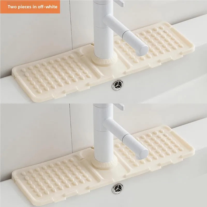 Two beige bath mats on a white bathtub with a faucet.