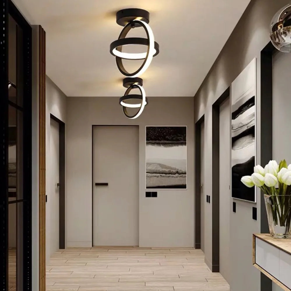 Modern hallway with ceiling lights and artwork on a wall