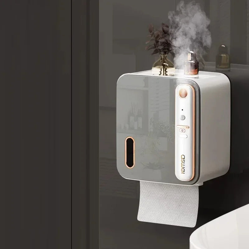 Wall-mounted paper towel holder with steam coming out, placed on a dark surface.