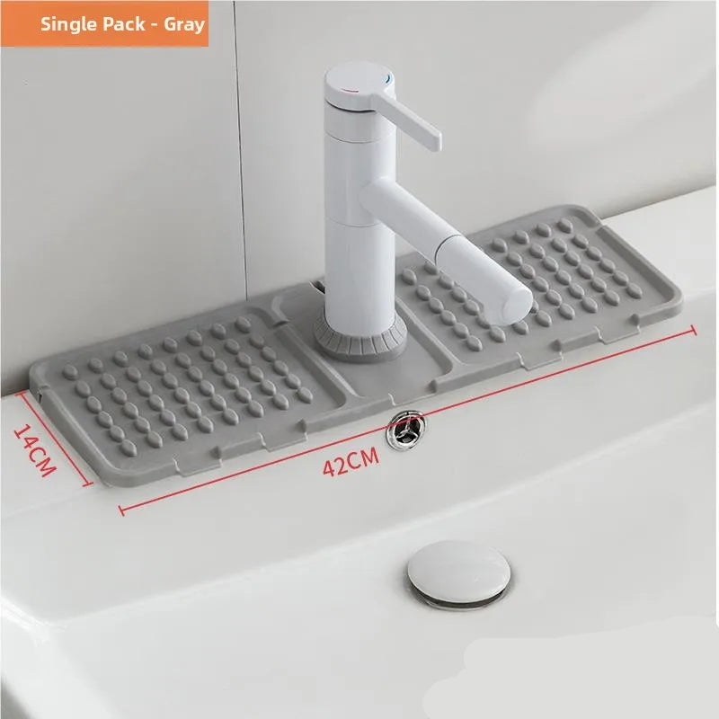 Gray bath mat with measurements over a bathtub, featuring a white faucet.