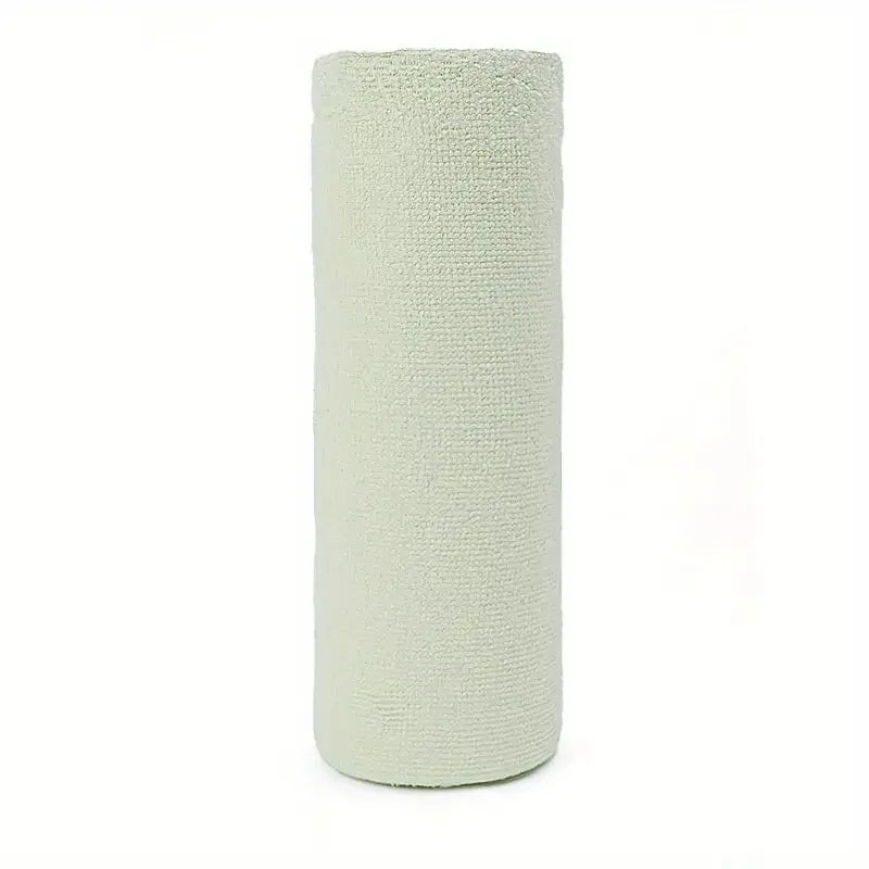 Light green cylindrical woven vase on a white background