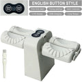 White electronic device with buttons and a brush on a white background