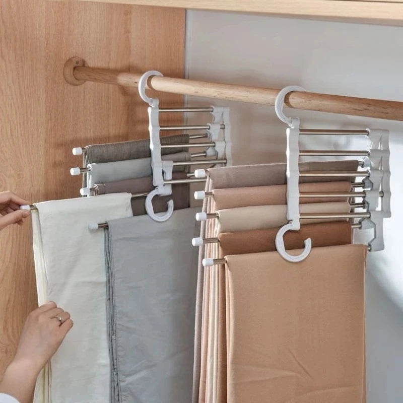 Multi-layered hanger with folded clothes in a closet