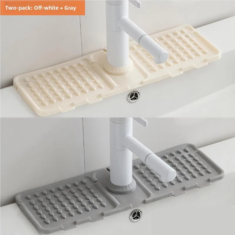 Two bath mats, one off-white and one gray, on a bathtub with water faucet.