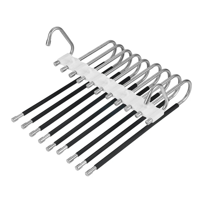 Set of metal hangers with black rods on a white background