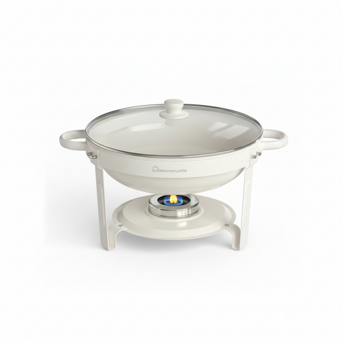 White chafing dish with food inside on a white background