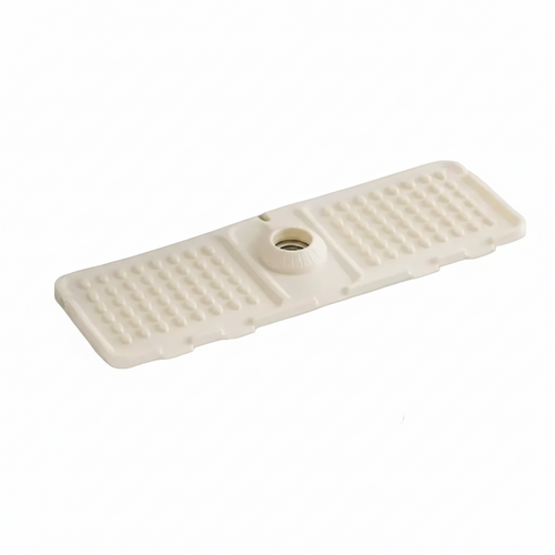 Beige sink mat on a white sink with measurements indicated