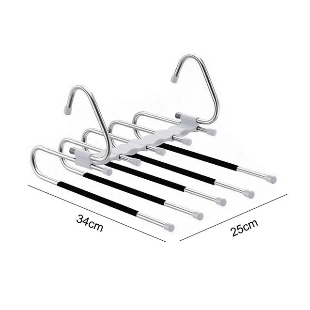 Set of metal hangers with black rods on a white background