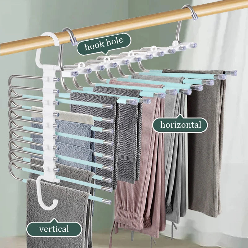 Pants hanging on a multi-layered hanger with labeled hook holes.