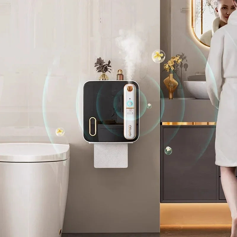 Smart toilet paper holder mounted on a bathroom wall with a woman in the background.