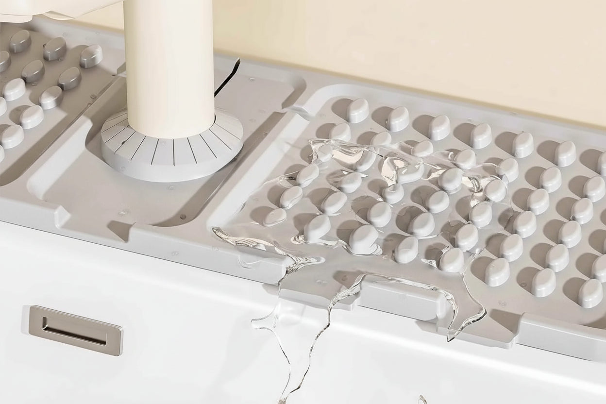 Diversion drainage design with uniform water drainage and anti-splash feature on a kitchen sink.